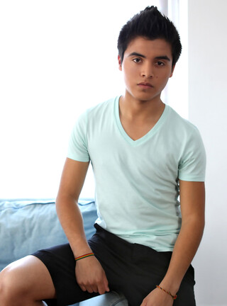 Skinny twink boy Ryan strokes his latino cock