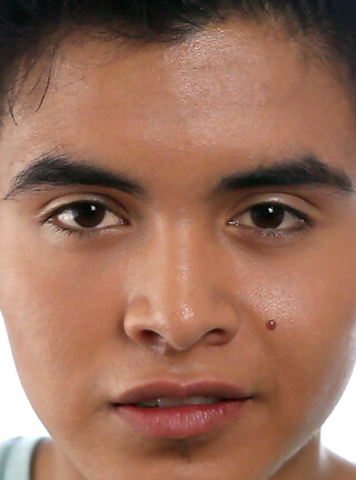 Skinny twink boy Ryan strokes his latino cock